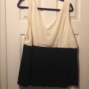 Off white and black sleeveless blouse